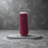 The purple-red yarn is used to roll other yarns and wool for hand crochet Application Scenario